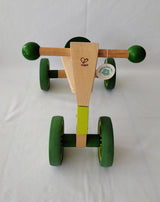 HAPE triciclo verde en madera